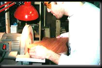 Owner Alex cutting the Perfect Neck and Samurai Headstock 